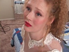 FreeKiloSex presents: Redhead in wedding dress models her pussy