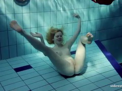 FreeKiloSex presents: Blonde goes for a swim and strips