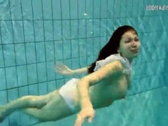 FreeKiloSex presents: Girl in white panties swims in pool