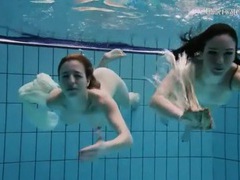 FreeKiloSex presents: Nearly naked girls go swimming in the pool