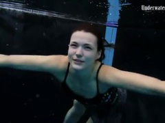 FreeKiloSex presents: Beautiful girl swims and smiles underwater