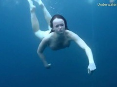 FreeKiloSex presents: Three ladies get naked swimming in the ocean