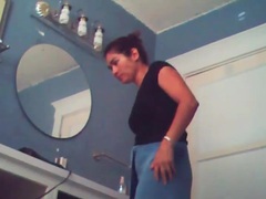 FreeKiloSex presents: Voyeur camera captures naked chick in bathroom