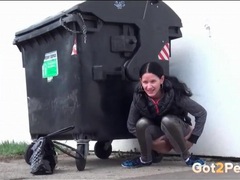 FreeKiloSex presents: Shiny leggings on a cutie going pee in public
