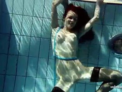 FreeKiloSex presents: In black stockings pretty girl goes for a swim