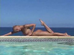 FreeKiloSex presents: Blonde strips from bikini and takes a dip