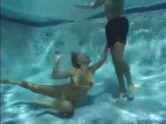 FreeKiloSex presents: She has a threesome underwater
