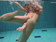 FreeKiloSex presents: Underwater with a busty naked babe as she swims