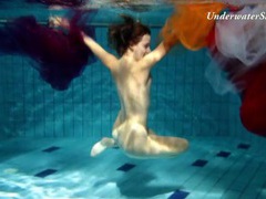 FreeKiloSex presents: Artful naked underwater show with a hairy pussy girl