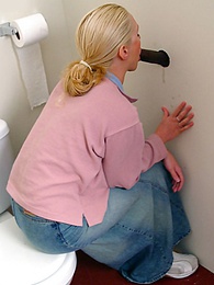 FreeKiloSex presents: Blonde girl Jamie sits on the toilet and blows a black gloryhole dong